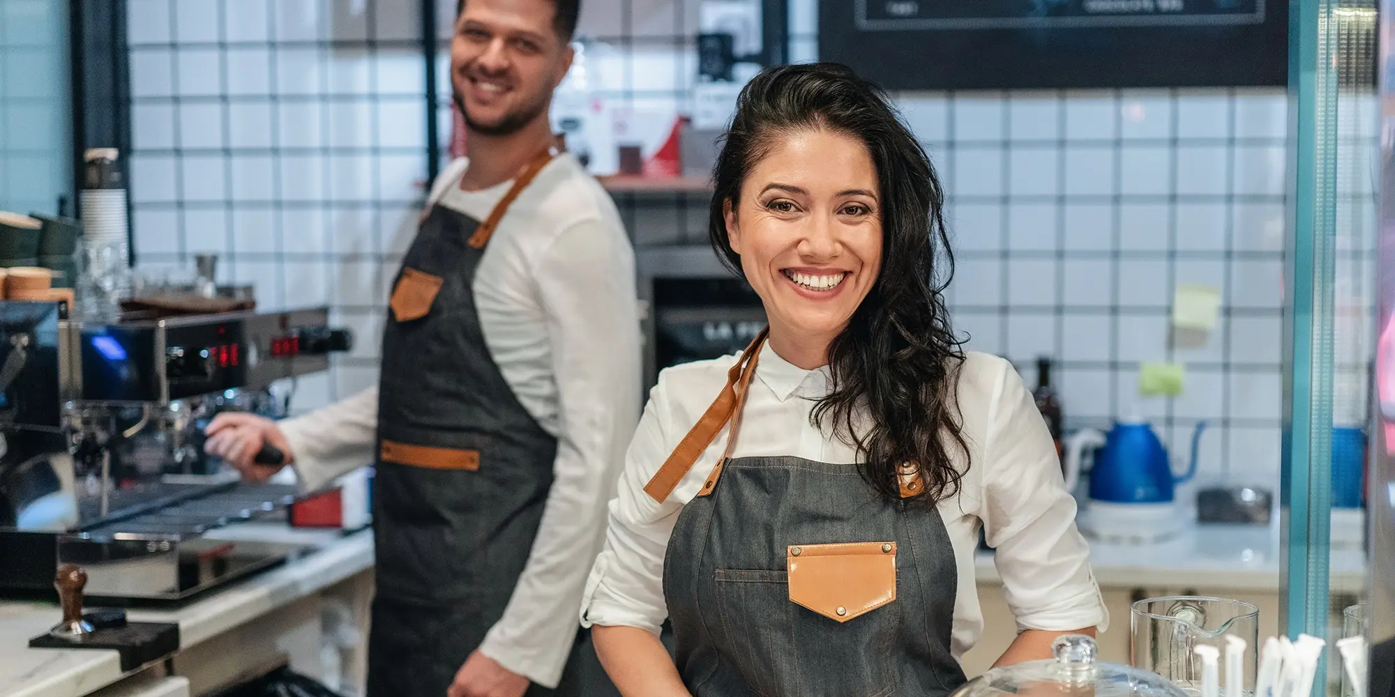 Two people running a cafe